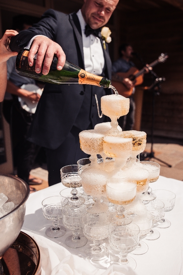 Surprise guests with a champagne tower!